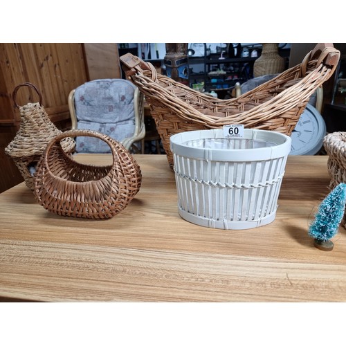 60 - A collection of 4 wicker baskets and a wicker bird house, a  good Harrod's wicker basket and 3 other... 