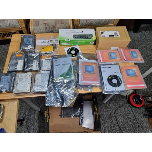 62 - A large quantity of computer parts to include a large quantity of hard drives featuring 50 GB hard d... 