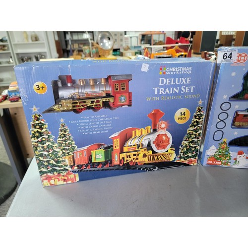 64 - 2x boxed train sets inc Santa's musical train set No.3388 along with one other train set, also inclu... 