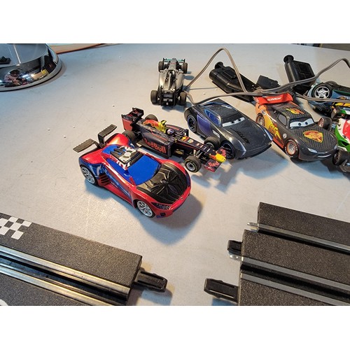 69 - Box containing a quantity of Carrera race track with cars and controllers with accessories