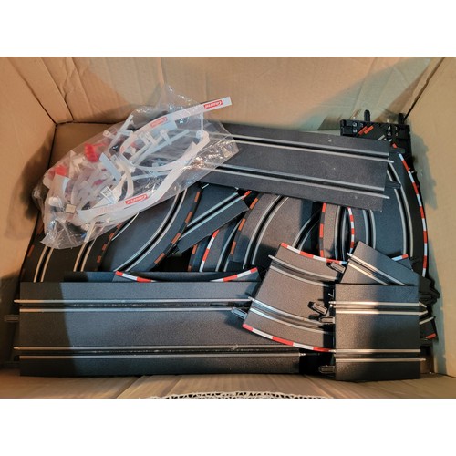 69 - Box containing a quantity of Carrera race track with cars and controllers with accessories