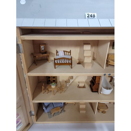 341 - Good quality Victorian style wooden dolls house with front opening complete with a very large quanti... 