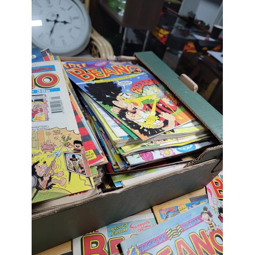 88 - Large job lot of Beano comics all stored correctly and many include original gifts still attached. I... 