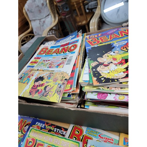 88 - Large job lot of Beano comics all stored correctly and many include original gifts still attached. I... 