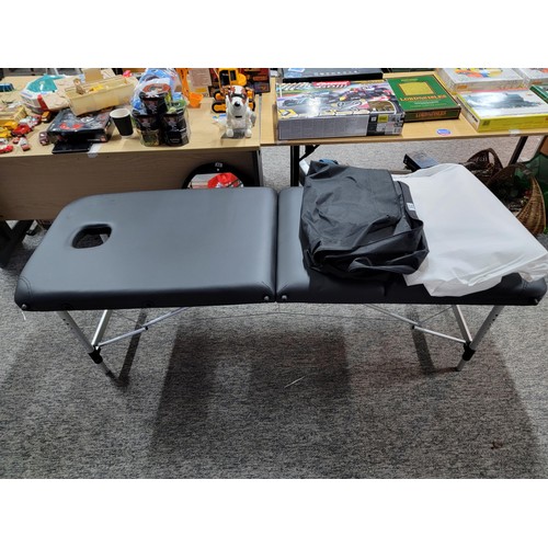 92 - Fox Hunter massage table, excellent condition with original carry bag in good order folds flat for e... 