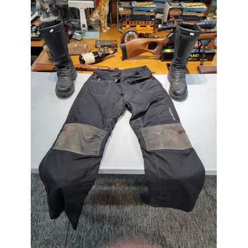 98 - Pair of good quality Spada Motorcycle boots size 9 along with a pair of motorcycle trousers with kne... 