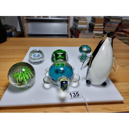 135 - A collection of 6 good glass paperweights to include an unusual turtle formed paperweight with 2 bab... 