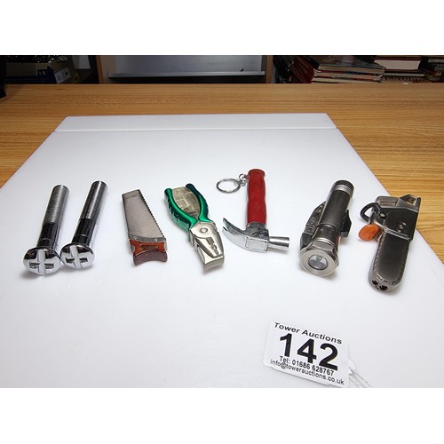 142 - We have collection of 7x collectable novelty lighters all tool related to include a hammer, bolts, a... 