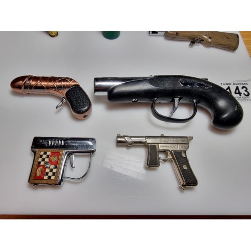 143 - A collection of 8 gun related collectable novelty lighters to include very rare Japanese collectable... 