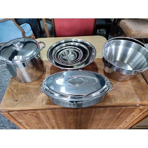 359 - A quantity of good quality stainless steel catering items including a set of 5 graduated bowls stamp... 