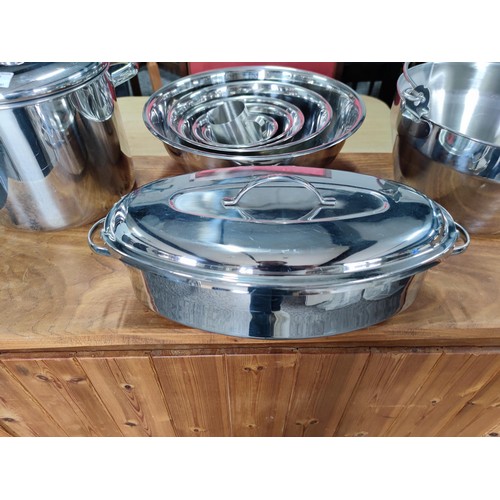 359 - A quantity of good quality stainless steel catering items including a set of 5 graduated bowls stamp... 