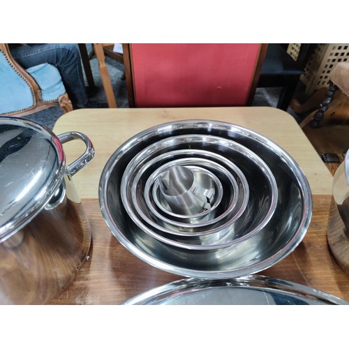 359 - A quantity of good quality stainless steel catering items including a set of 5 graduated bowls stamp... 