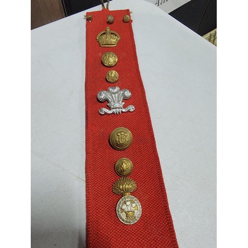 110 - Large red fabric wall hanger containing a large quantity of lapel badges inc RWF, RASC, REME, Boy Sc... 