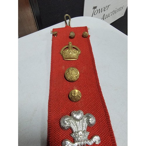 110 - Large red fabric wall hanger containing a large quantity of lapel badges inc RWF, RASC, REME, Boy Sc... 