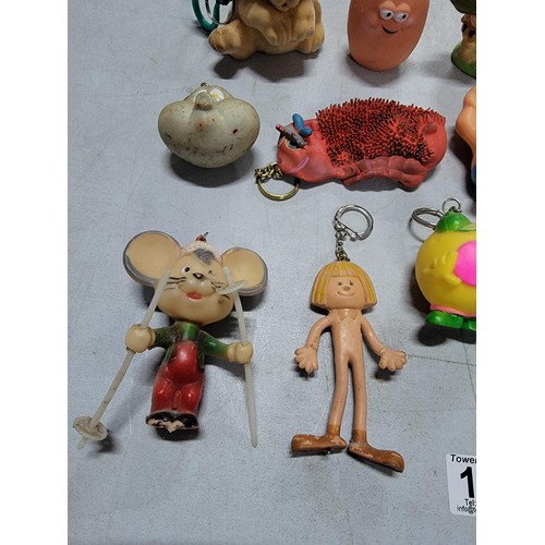 115 - Collection of rubber key rings inc a dog, danger mouse, pair of fairy figures, Telly Toy etc all in ... 