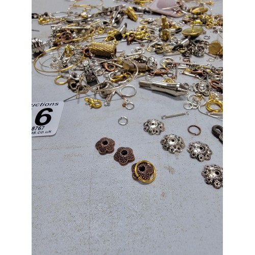 116 - Quantity of jewellery making accessories inc wire, floral decoration, white metal jewellery balls et... 