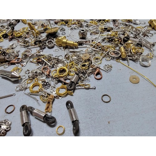 116 - Quantity of jewellery making accessories inc wire, floral decoration, white metal jewellery balls et... 