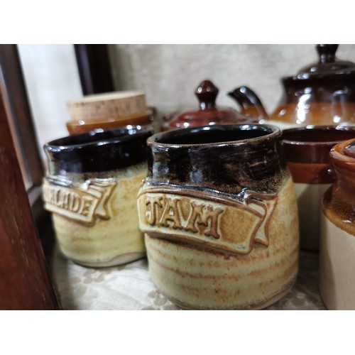 363 - Large quantity of stone ware salt glazed brown and tan jugs, storage jars, vinegar jugs, condiment s... 