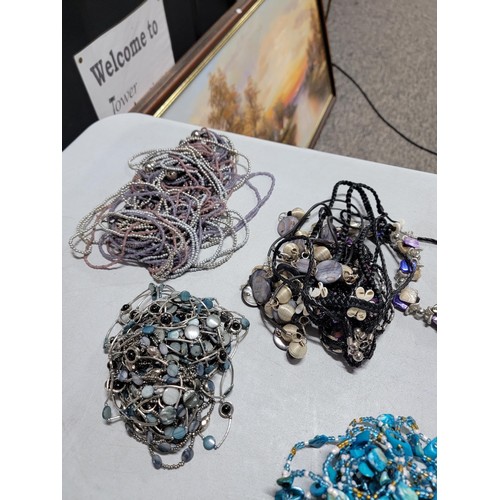 121 - Large quantity of costume jewellery necklaces inc beaded, metal stars, chokers, etc