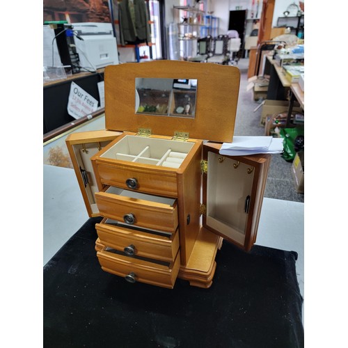 126 - Quantity of wooden jewellery boxes inc a 4 drawer jewellery chest with lift up lid showing compartme... 