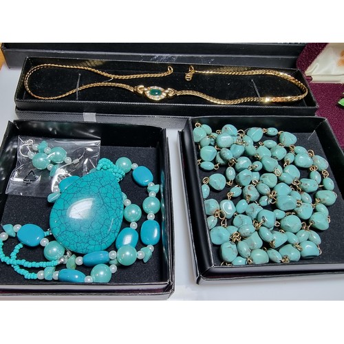 145 - A quantity of boxed costume jewellery to include turquoise style necklaces, a Royal Albert china flo... 