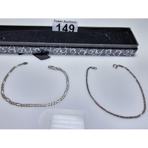 149 - 2x 925 silver bracelets, one with a Figaro curb link design the other with a twisted design. Both in... 