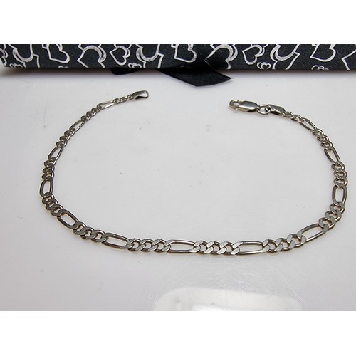 149 - 2x 925 silver bracelets, one with a Figaro curb link design the other with a twisted design. Both in... 