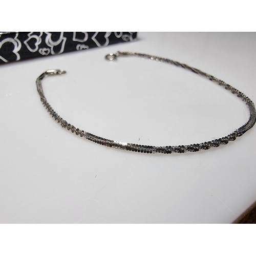 149 - 2x 925 silver bracelets, one with a Figaro curb link design the other with a twisted design. Both in... 