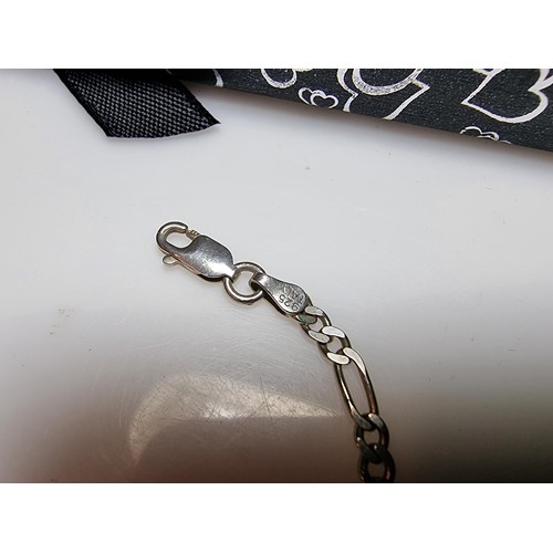 149 - 2x 925 silver bracelets, one with a Figaro curb link design the other with a twisted design. Both in... 