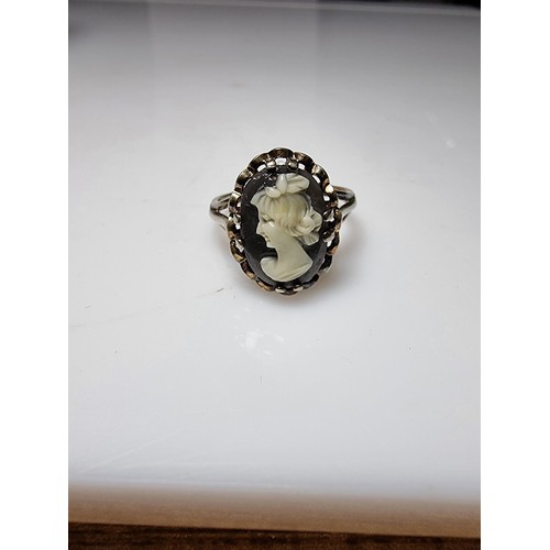 152 - A sterling silver cameo ring of a lady looking left, carved out of a hard stone, in good clean condi... 