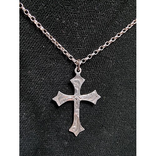 162 - A 925 silver engraved cross pendant set on a good 18