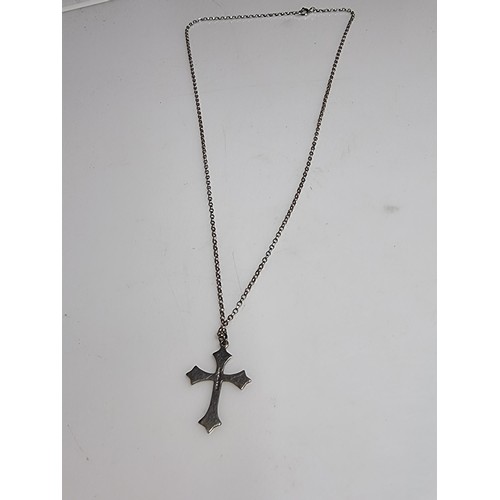 162 - A 925 silver engraved cross pendant set on a good 18