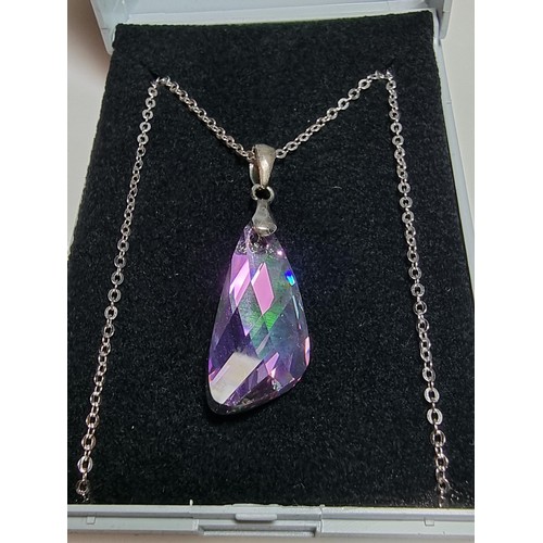 164 - A stunning 925 silver pendant with an iridescent glass crystal pendant set on an 18