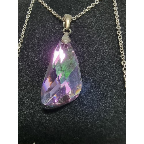 164 - A stunning 925 silver pendant with an iridescent glass crystal pendant set on an 18