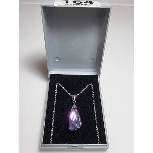 164 - A stunning 925 silver pendant with an iridescent glass crystal pendant set on an 18