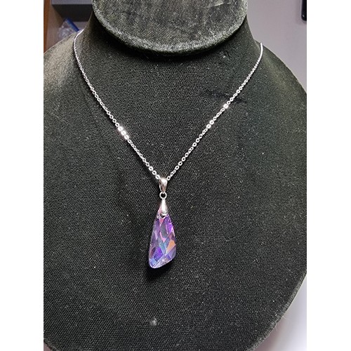 164 - A stunning 925 silver pendant with an iridescent glass crystal pendant set on an 18