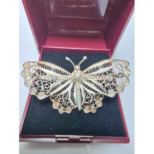 172 - A pretty fully hallmarked 800 silver filigree butterfly brooch with intricate detail in excellent cl... 