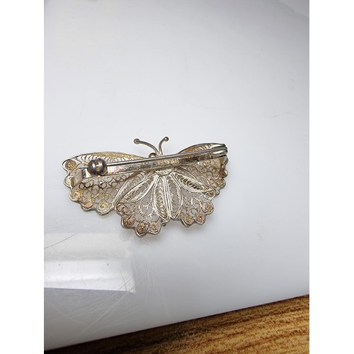 172 - A pretty fully hallmarked 800 silver filigree butterfly brooch with intricate detail in excellent cl... 