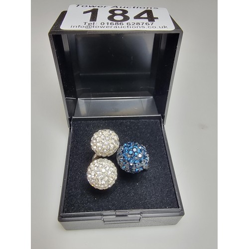 184 - A 925 silver unusual ring with 3 large balls in set with clear studded crystals and blue studded cry... 