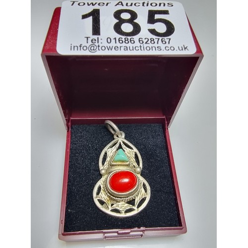 185 - A good quality vintage 925 silver Native American Navajo style pendant inset with genuine red coral ... 