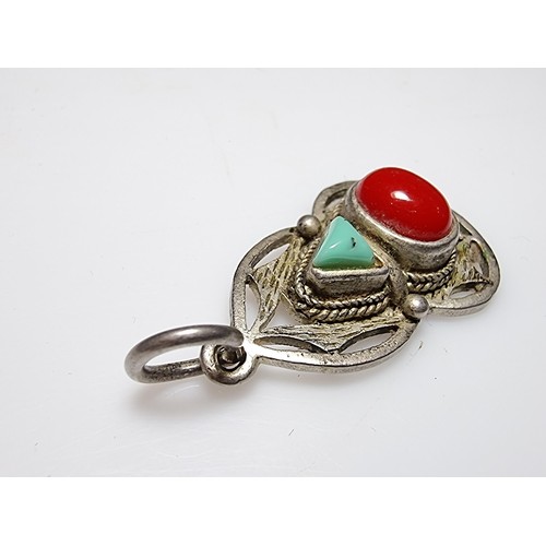 185 - A good quality vintage 925 silver Native American Navajo style pendant inset with genuine red coral ... 