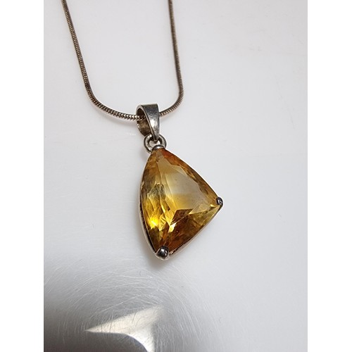 186 - A pretty 925 silver pendant inset with a large genuine citrine stone set on an 18