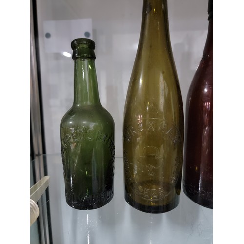 304 - Large quantity of glass and earthenware bottles inc local beer bottles, Al's Sauce, and a quantity o... 