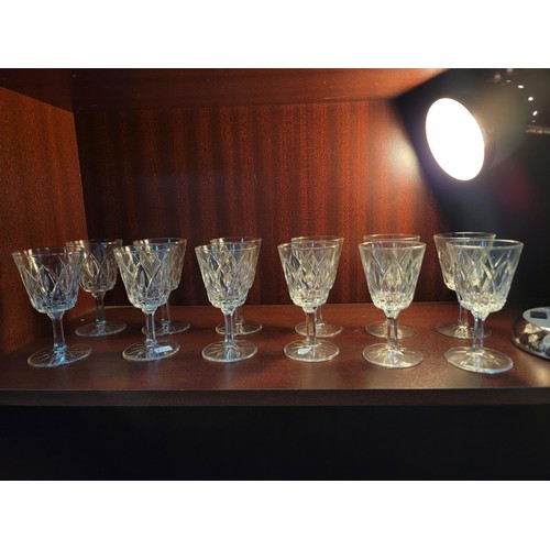 323 - Collection of 12 cut glass glasses in good order