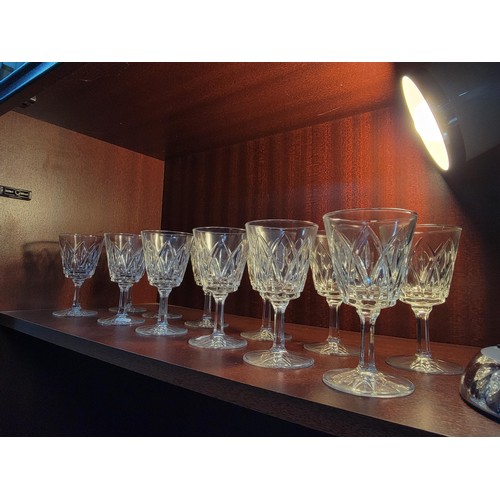 323 - Collection of 12 cut glass glasses in good order