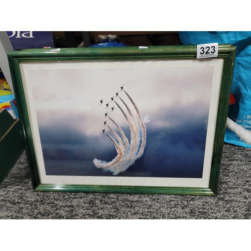 324 - 2x framed and glazed photos of The Red Arrows in flight height 33.5cm length 45cm