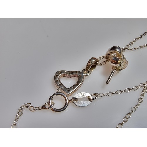 194 - A 925 silver child's matching jewellery set with a heart pendant and 14