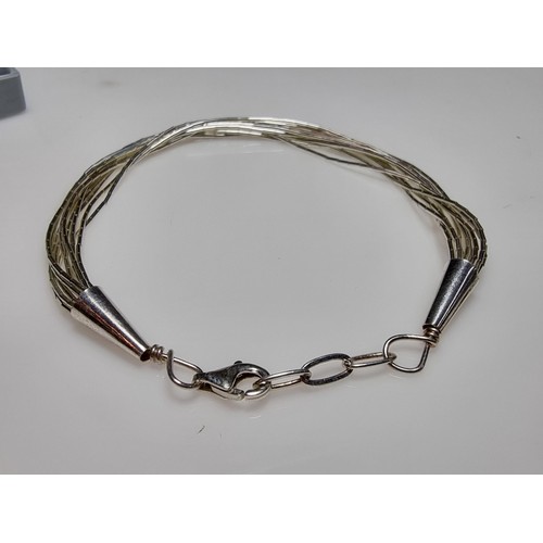 195 - A 925 silver multi strand bracelet in good clean condition, boxed. Length 7.5