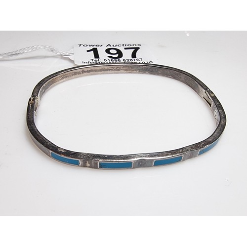 197 - A 925 silver Mexico hinged bangle with blue turquoise inserts.