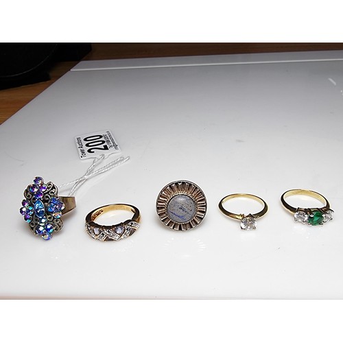 200 - 5x good quality costume dress rings to include a 925 silver ring inset with a large round blue stone... 